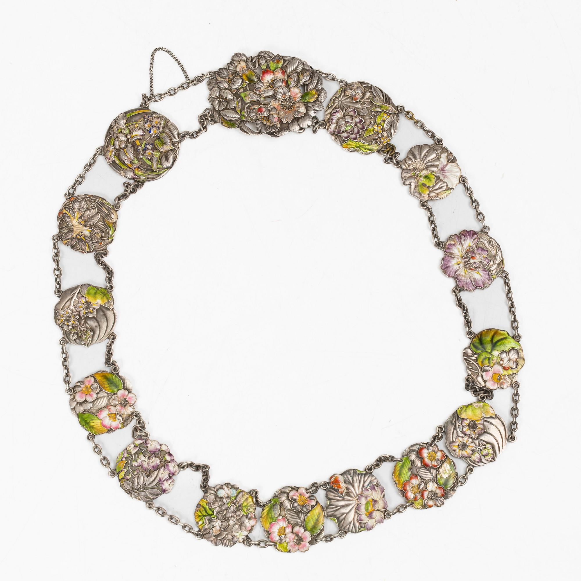 A Japanese Art Nouveau silver and enamel floral belt, by Sanju Saku, Meiji period (1868-1912).