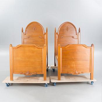 CARL CHRISTIAN CHRISTENSEN, a pair of jugend beds, signed and dated 1919.