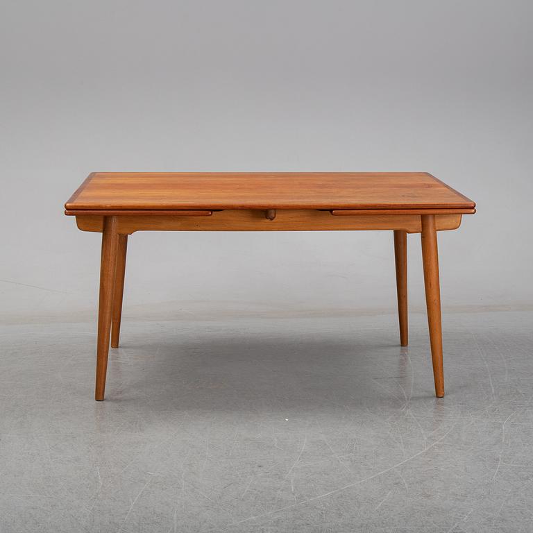 Hans J Wegner, a teak dining table, Andreas Tuck, Denmark.