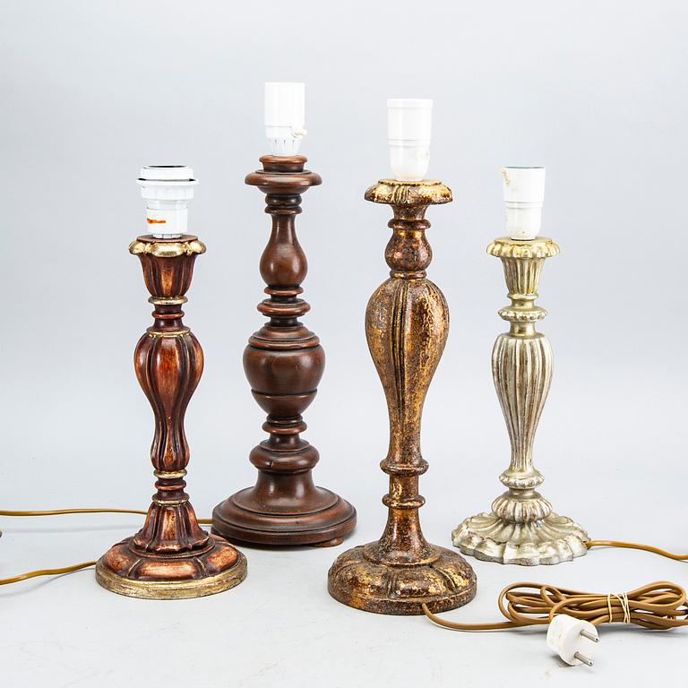 A set of four wood table lamps from Paoletti, Firenze Italy, second half of 20th century.