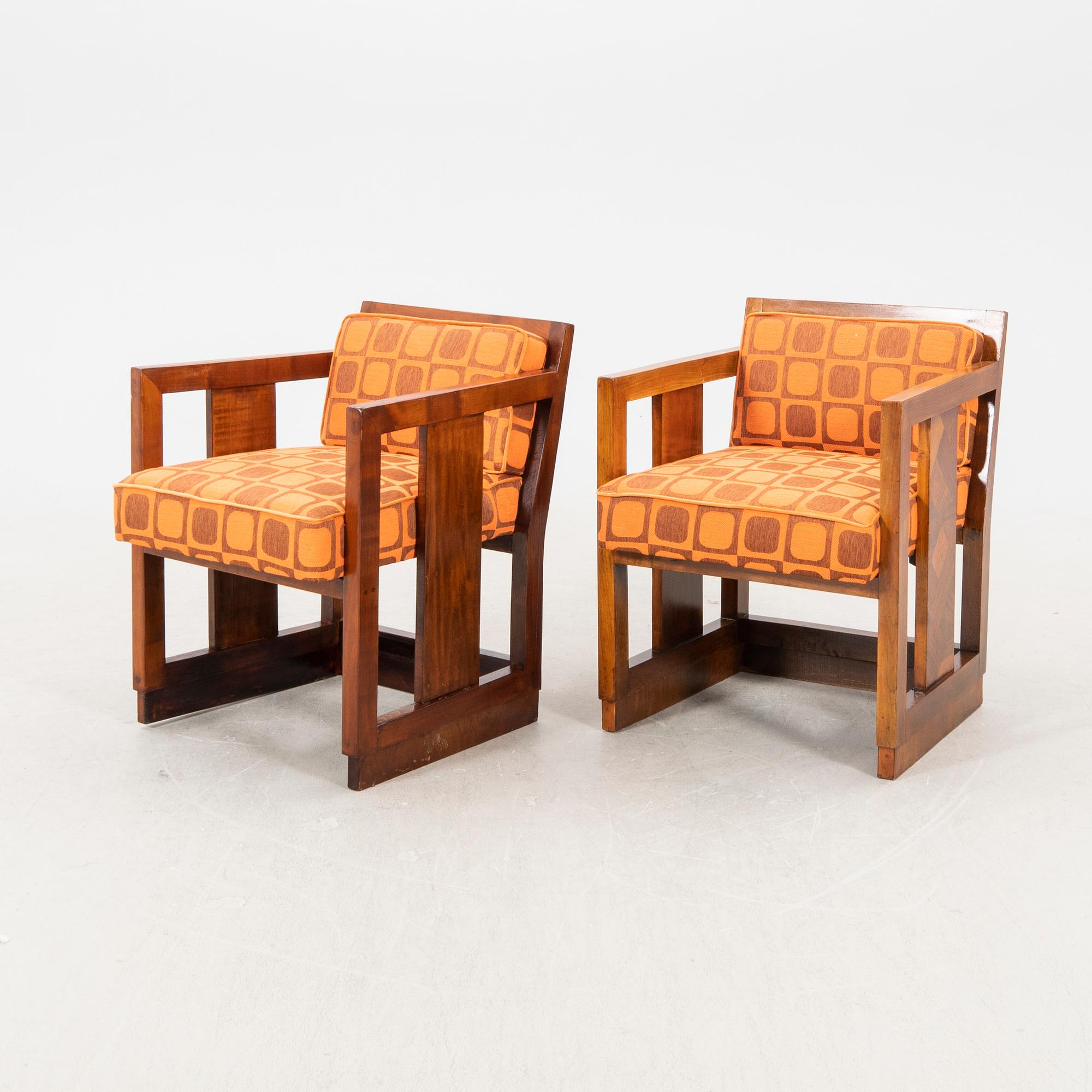 A pair of similar stained wood art déco armchairs from the first half of the 20th century.