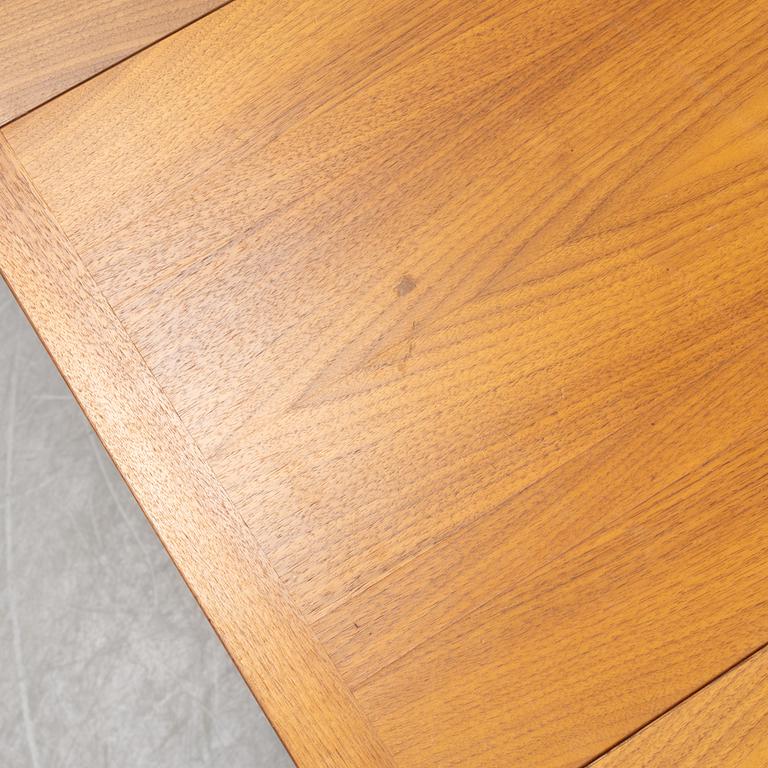 A teak veneered dining table, 1960's.