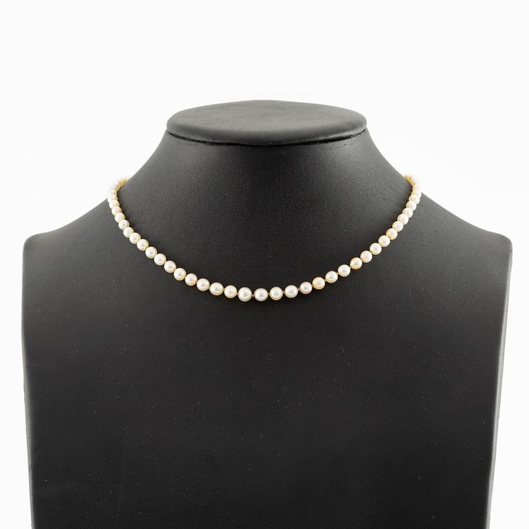 Pärlcollier lås 18K guld med en gammalslipad diamant och rosa stenar.