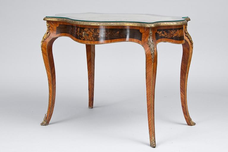 TABLE WITH GLASS TOP.