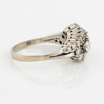 14K white gold and brilliant cut diamond ring.