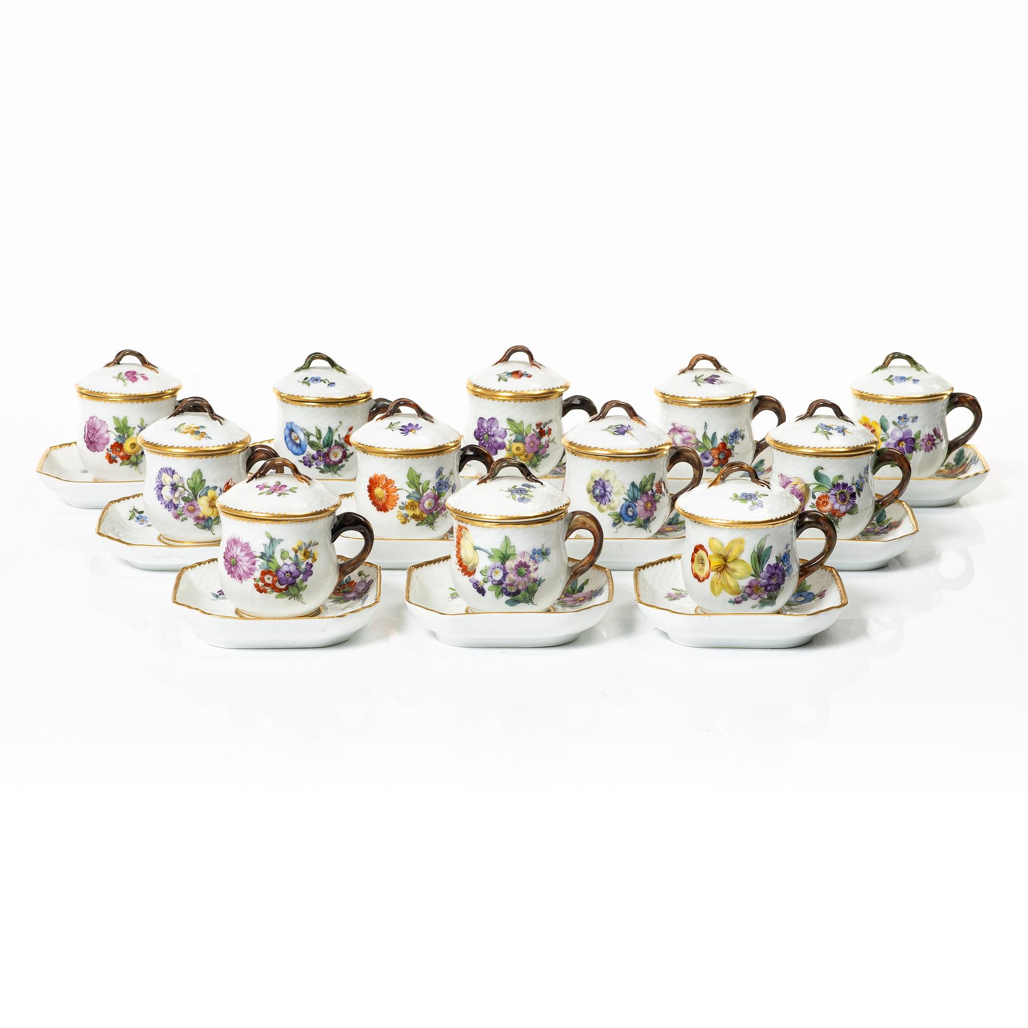 Royal Copenhagen, twelve cream cups with saucers, 'Saxon Flower', Denmark, 1923-34.