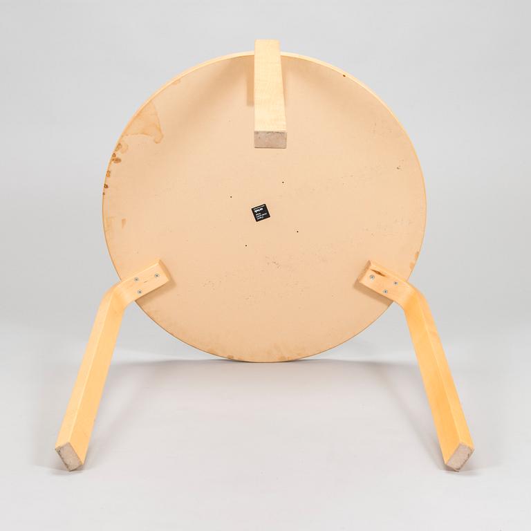 Alvar Aalto, a table and three chairs, Artek 2006 and 2007.