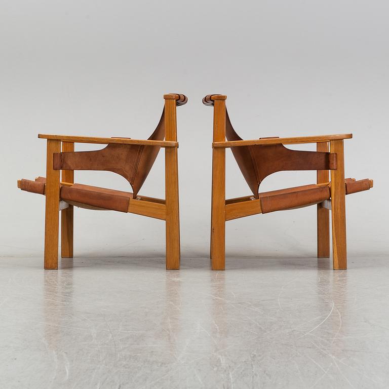 Carl-Axel Acking, A pair of 'Trienna' armchairs, 1950-60s.