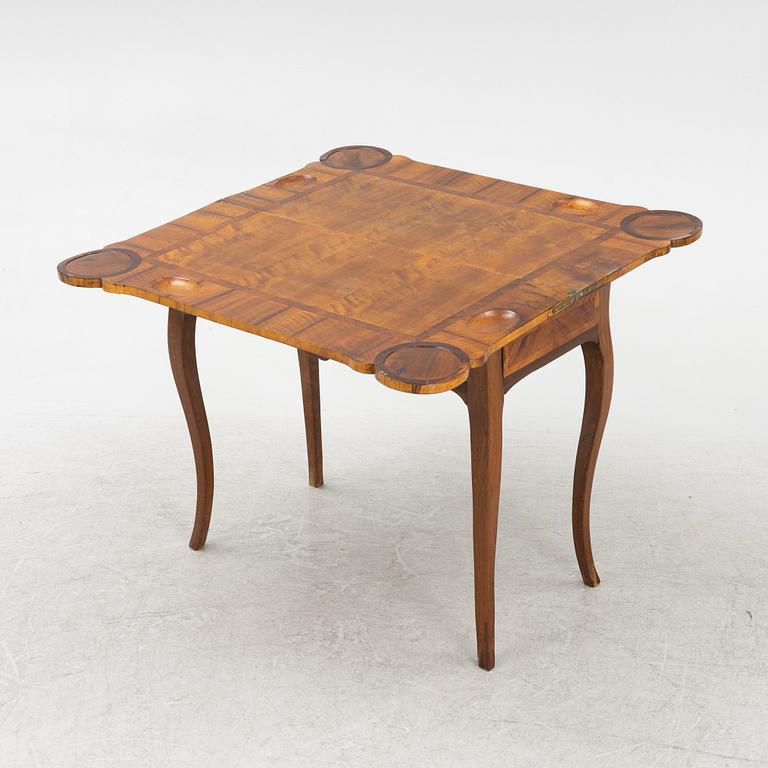 A rococo parquetry games table, later part of the 18th century.