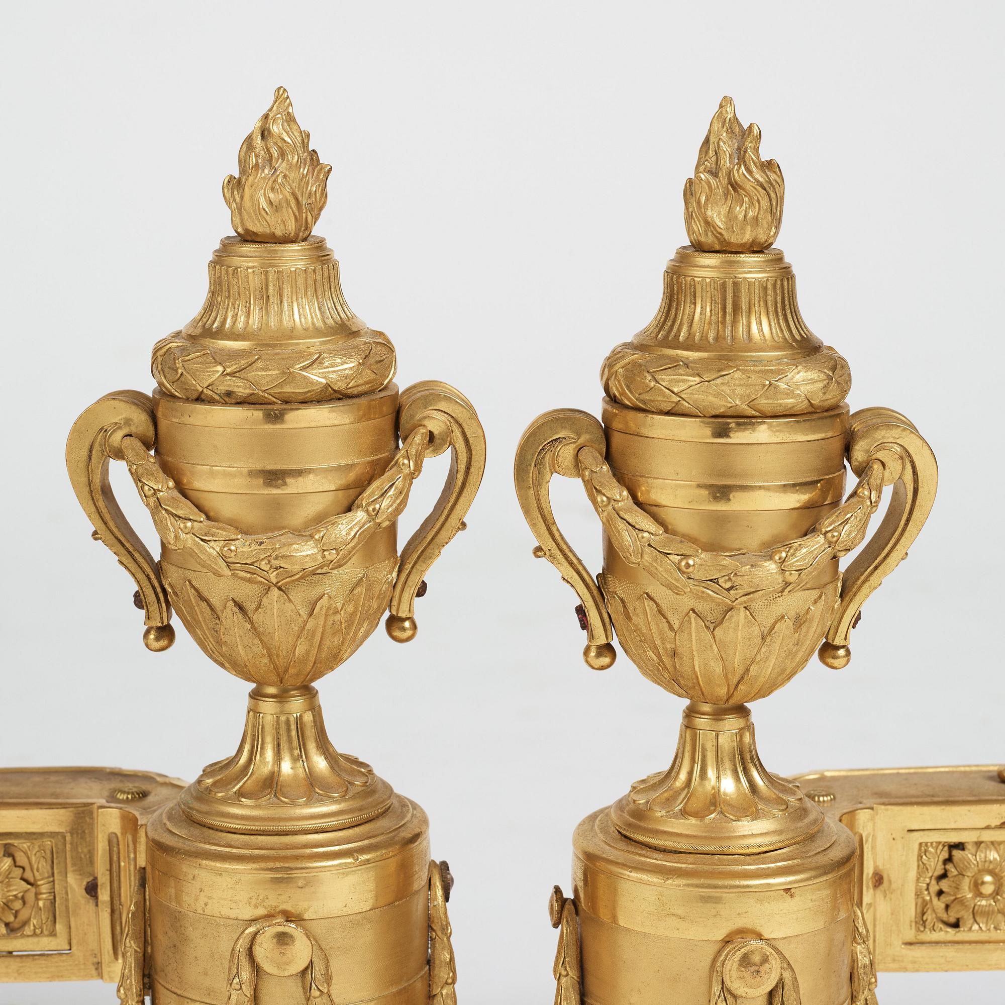 A pair of Louis XVI 18th Century bronze chenets.