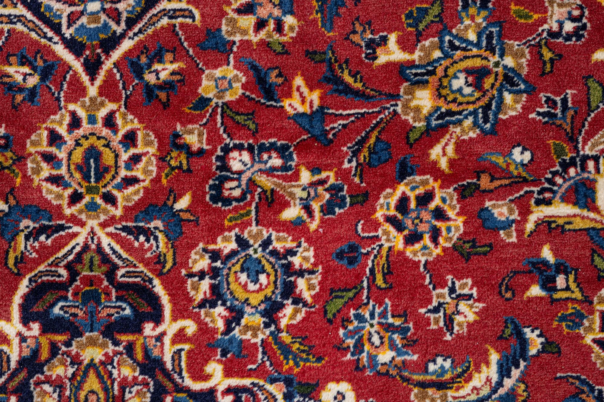 An oriental carpet, c. 340 x 240 cm.
