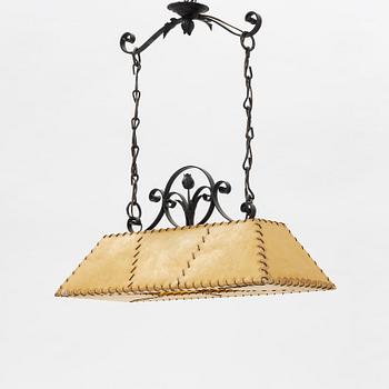 A chalet style mid century modern ceiling lamp.