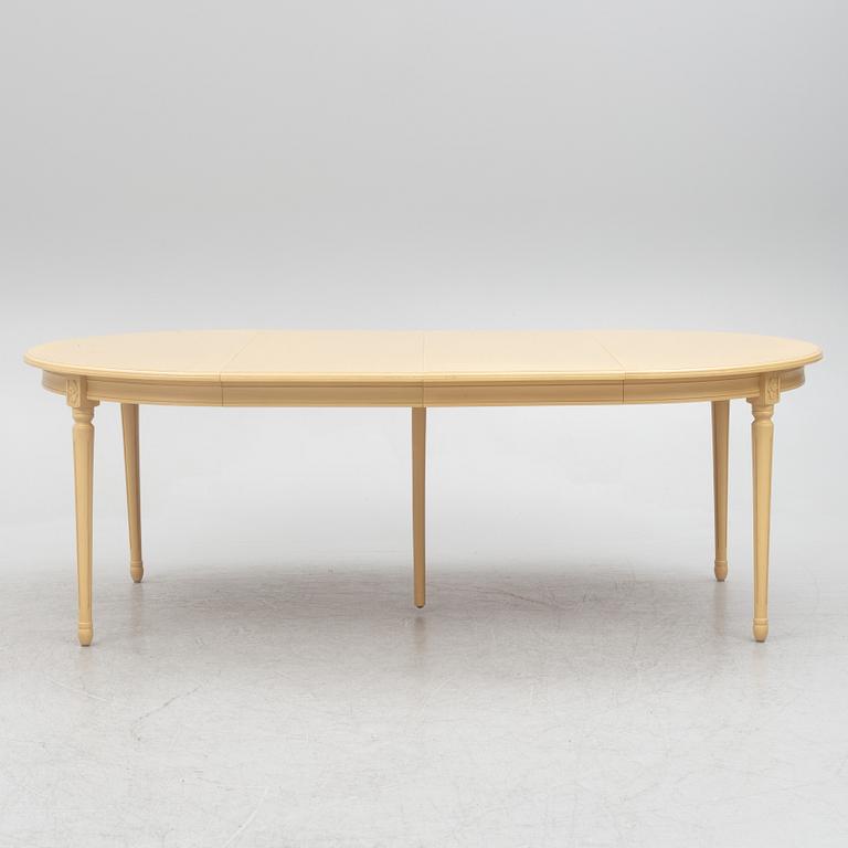 A Gustavian style dining table with six dining chairs, Sweden, 21st century.