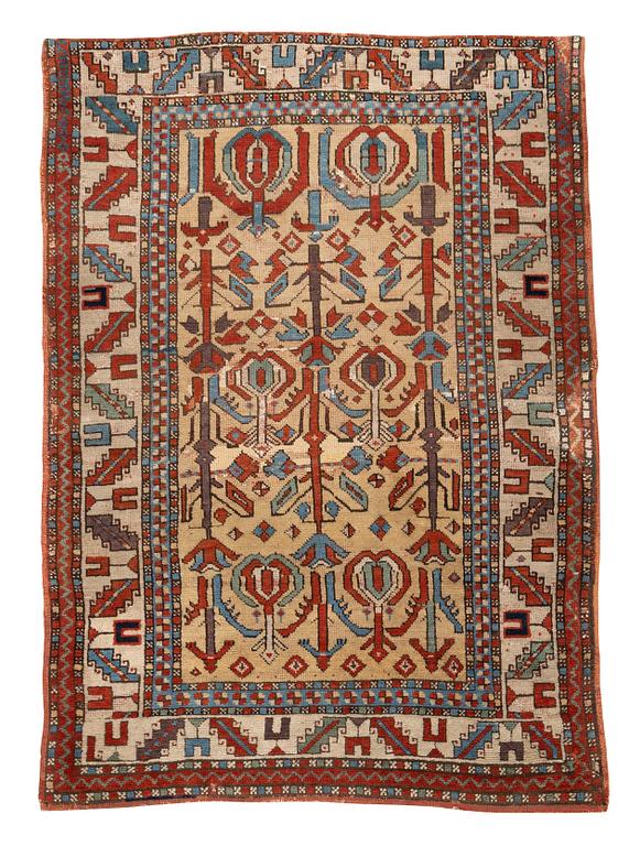 A rug, antique Anatolian/Caucasian, ca 148-149 x 104,5-110 cm (as well as 1-1,5 cm flat weave at one end).