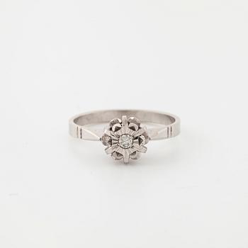 A single cut diamond ring.