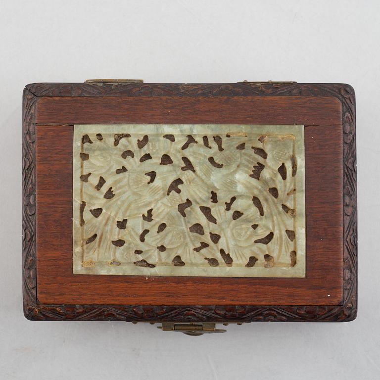 Two Chinese hardwood boxes with nephrite plaques, 20th century.