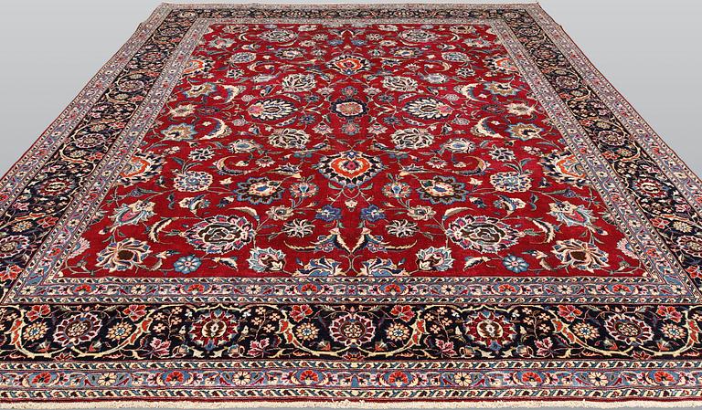 A Meshed carpet, approx. 340 x 295 cm.