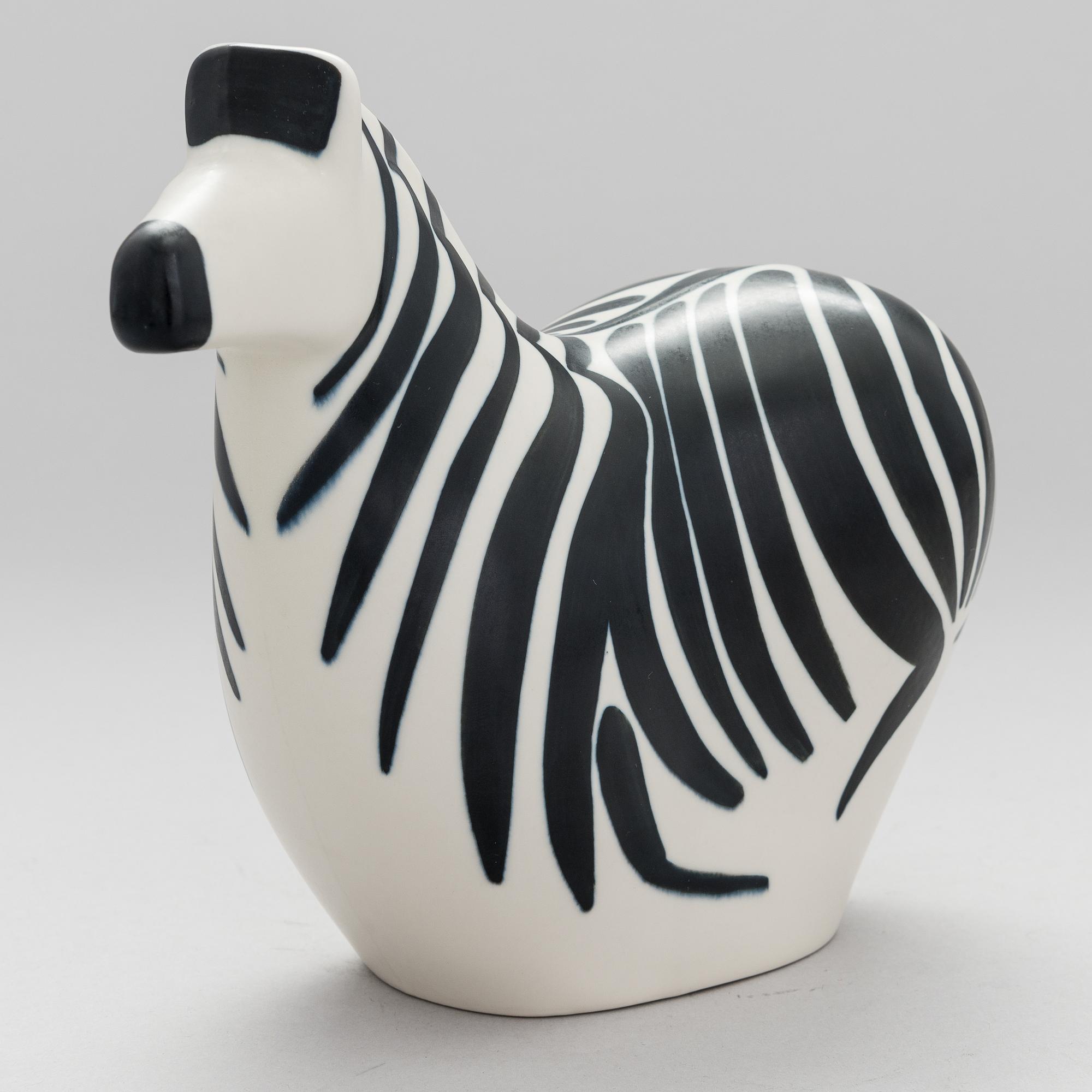 A STONEWARE FIGURINE by LILLEMOR MANNERHEIM, signed Lillemor Arabia -85.