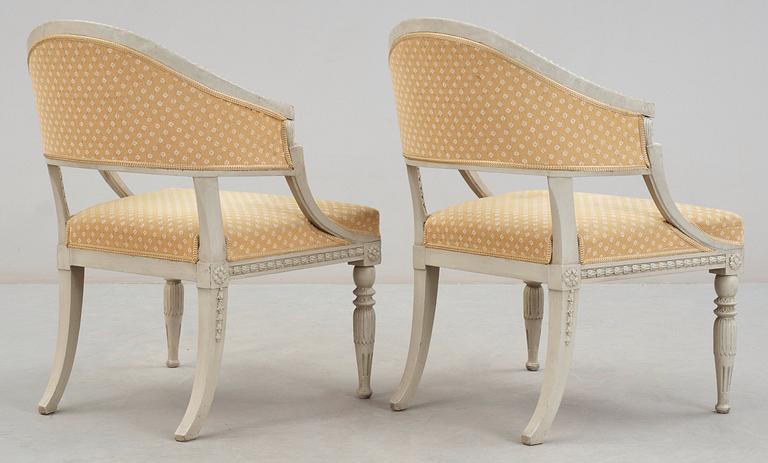 A pair of late Gustavian early 19th century armchairs.