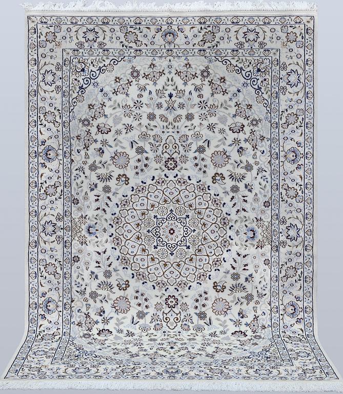 A Nain rug, part silk, so-called 9LAA, approx. 206 x 133 cm.