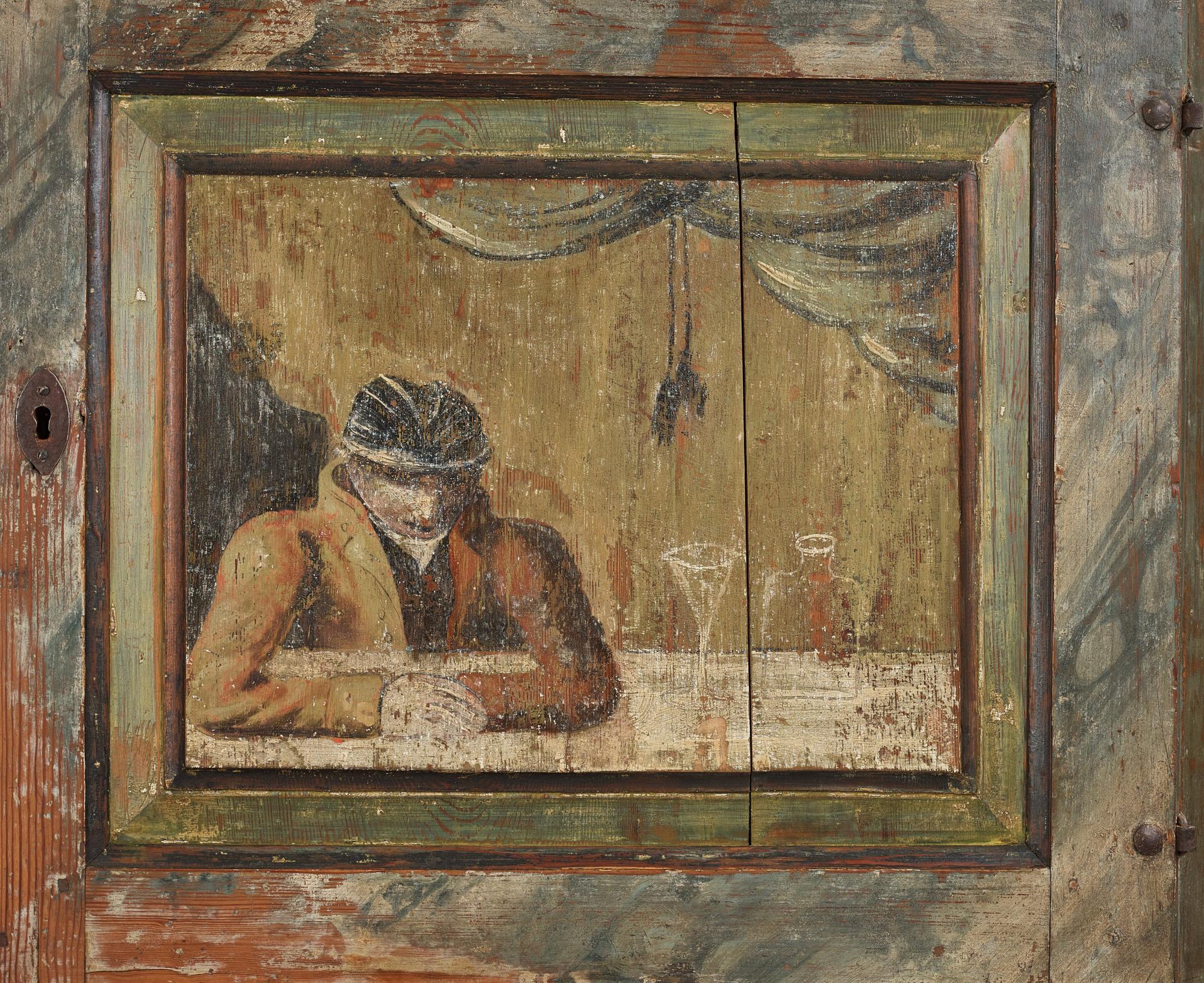 A Swedish polychrome-painted corner cabinet attributed to J. Bäckström (1773-1837).