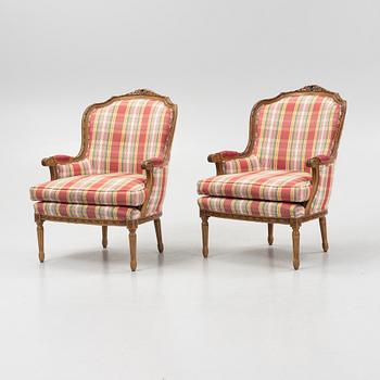 A pair of Louis XVI-style armchairs, second half of the 20th Century.