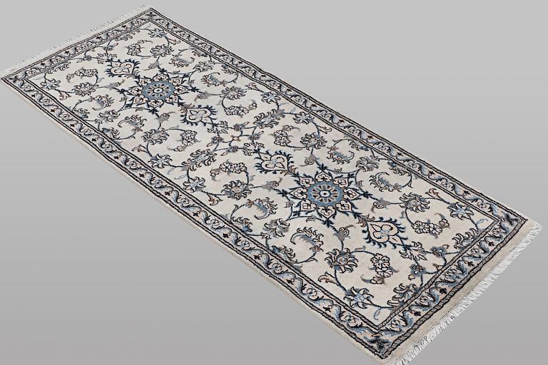 A runner carpet, Nain, part silk, ca 197 x 77 cm.