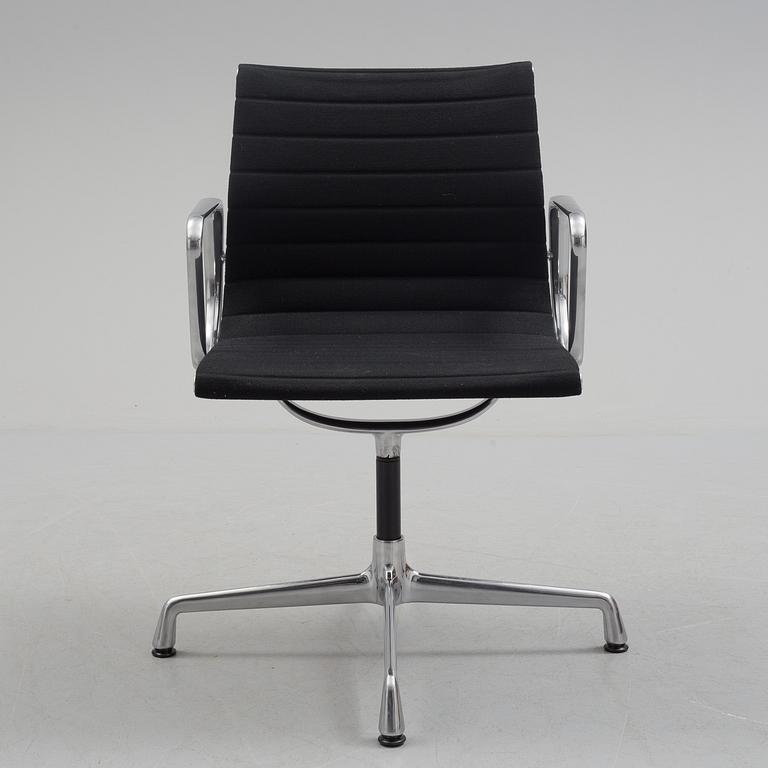 A 'EA 104 Swivel' armchair by Charles & Ray Eames, Vitra, 2016.