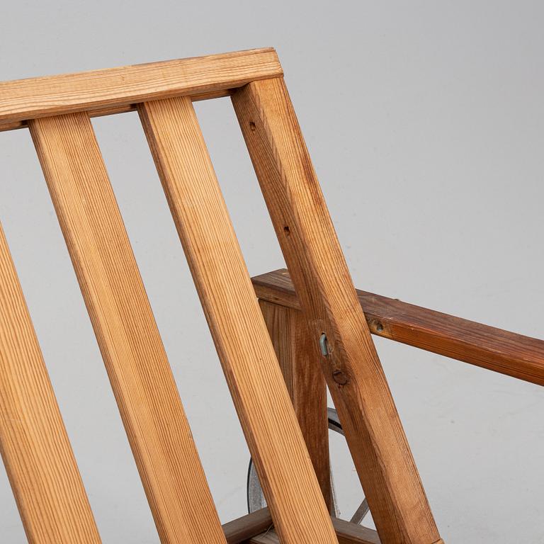 A stained pine garden sofa by Elsa Stackelberg.