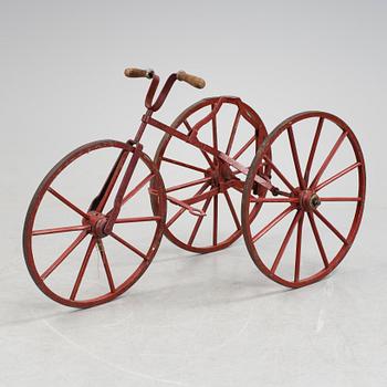 An early 20th century tricycle bike.