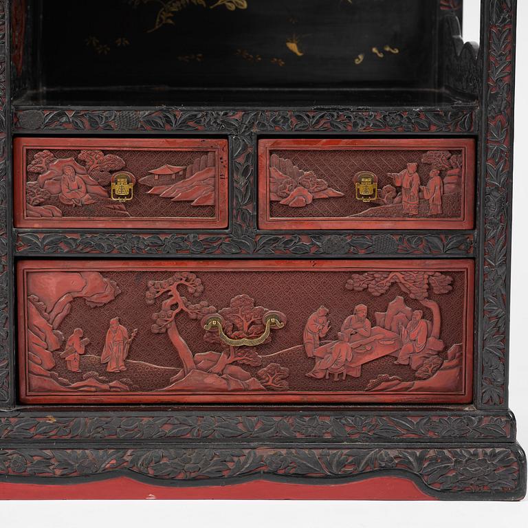 A lacquer display cabinet, late 19th century.