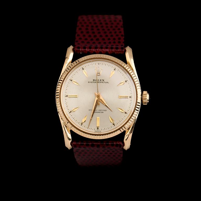 ARMBANDSUR, 18 k guld, Rolex Oyster Perpetual, Bombay 6590, 1900-talets mitt.