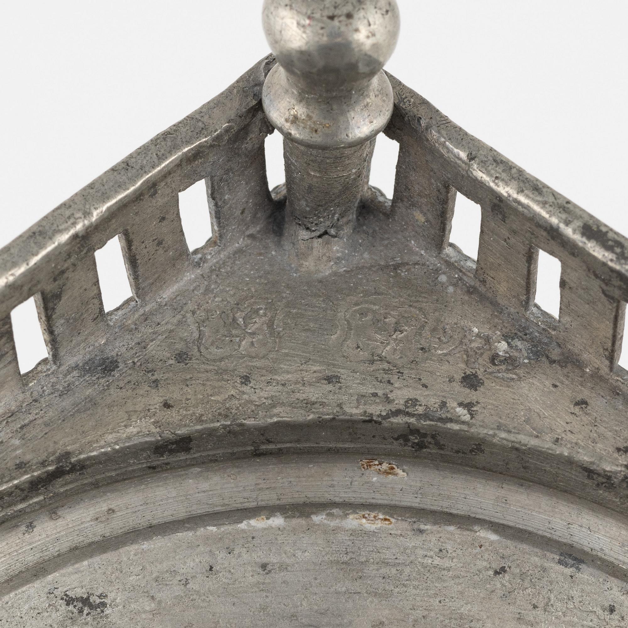 A matched pair of pewter candle sticks, 19th Century.