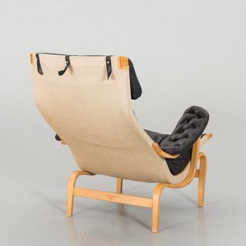 BRUNO MATHSSON, a Dux "Pernilla" lounge chair.