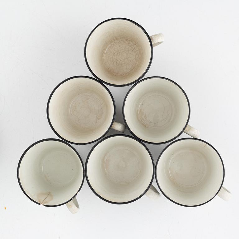 Eugen Trost, eleven coffee cups with three saucers, 'Zebra', Upsala-Ekeby Gefle.