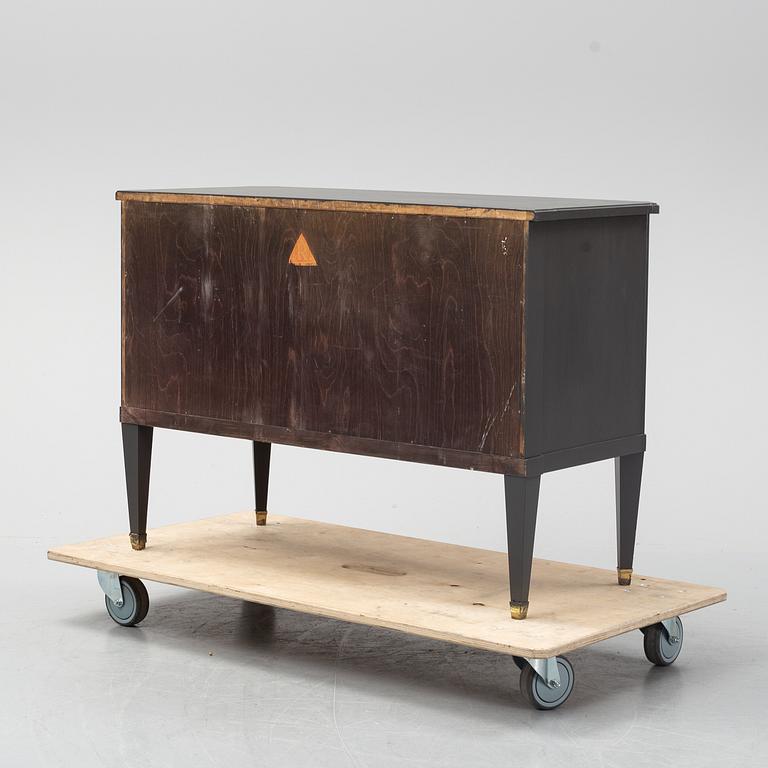 A chest of drawers from the first half of the 20th century.