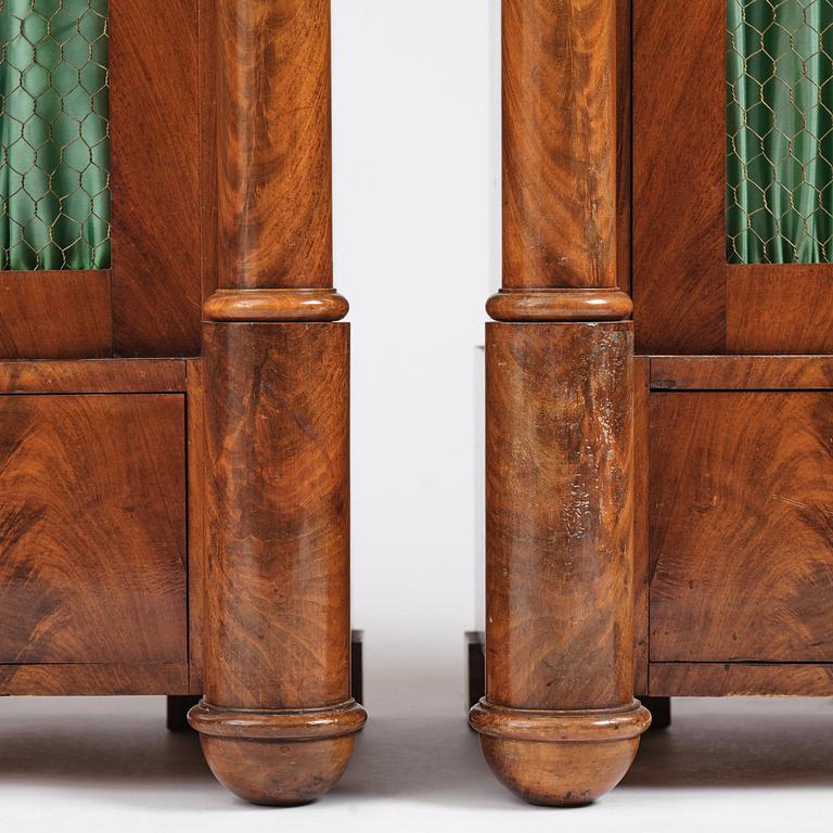 A pair of Swedish Empire mahogany bibliothèques, Stockholm, early 18th century.