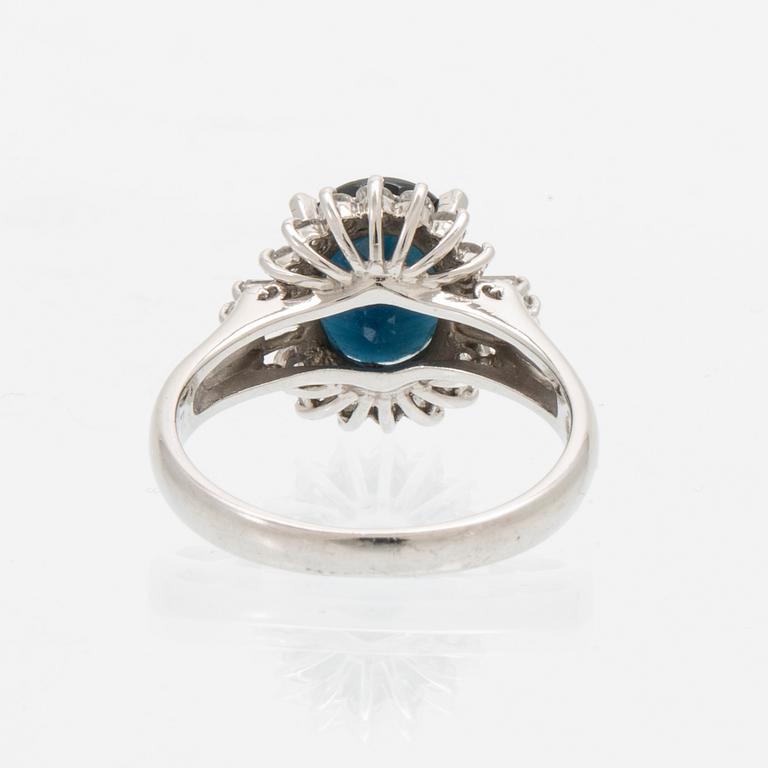 Ring, Platinum 850 with brilliant and tapered baguette cut diamonds and an oval faceted sapphire.