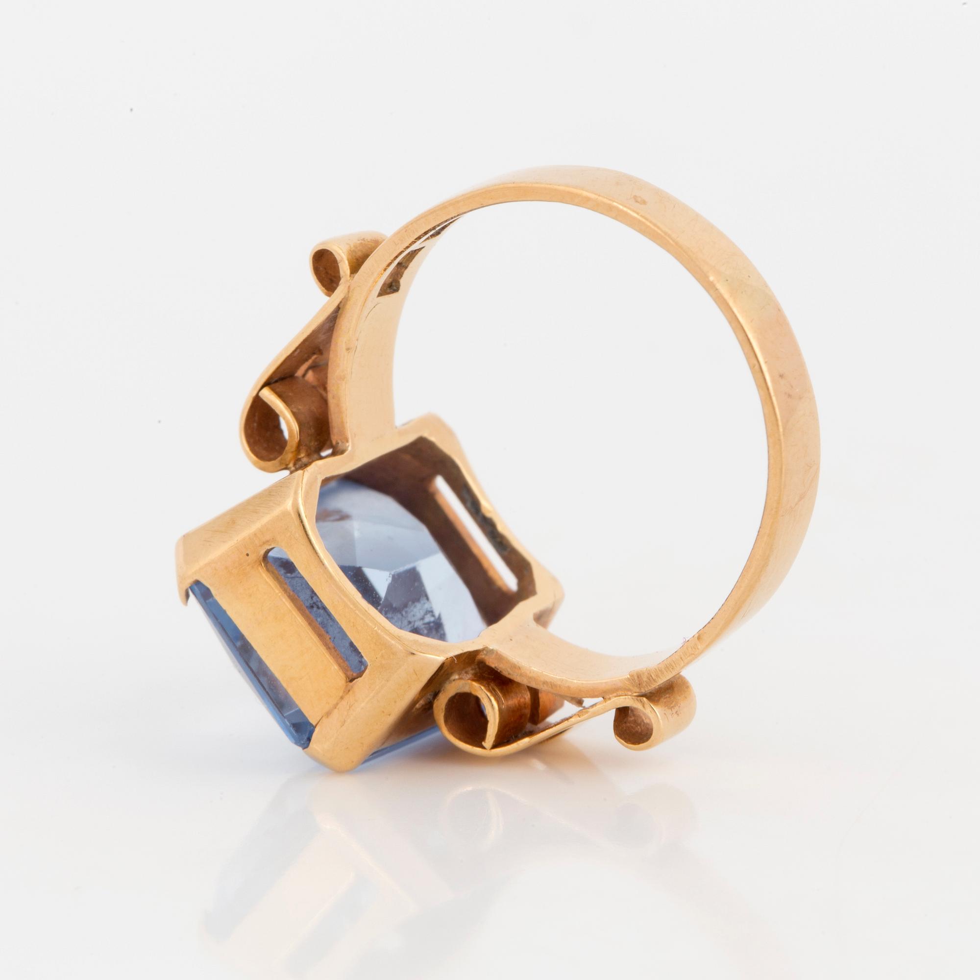 A ring with synthetic blue spinel.