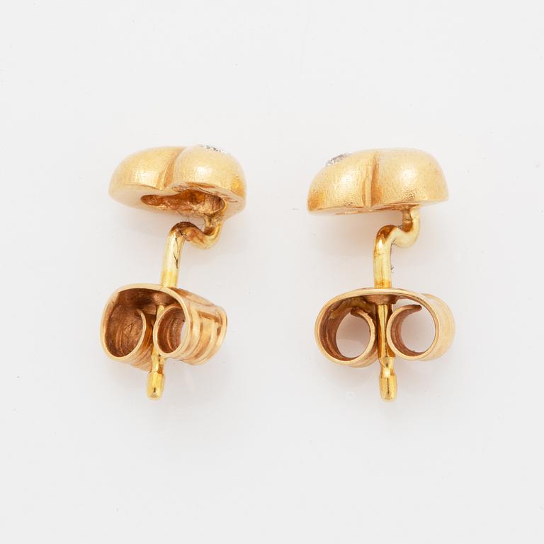 Ole Lynggaard heart shpade 14K gold and diamond earrings.