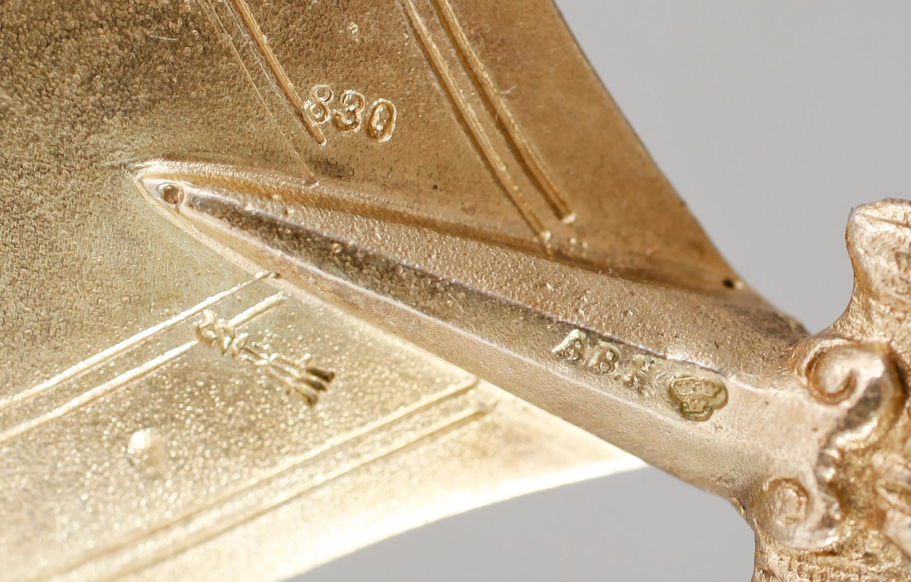 SKED, förgyllt silver, svenska importstämplar, omkring år 1900. Vikt ca 55 gram.