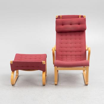 Bruno Mathsson, a 'Migo' armchair with a foot stool, Mathsson International, Värnamo.