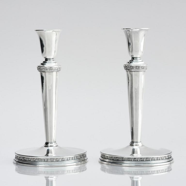 Eric Råström, a pair of silver candlesticks, company CG Råström, Stockholm 1974.