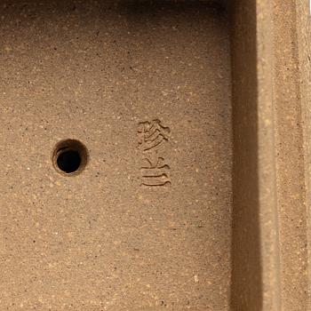 Two yellow yixing teapots, China, 1980/90s.