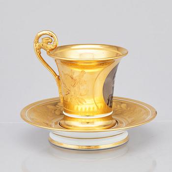 A French Empire cup by Darte Freres a Paris, with a portrait of the Swedish King Carl XIV Johan.