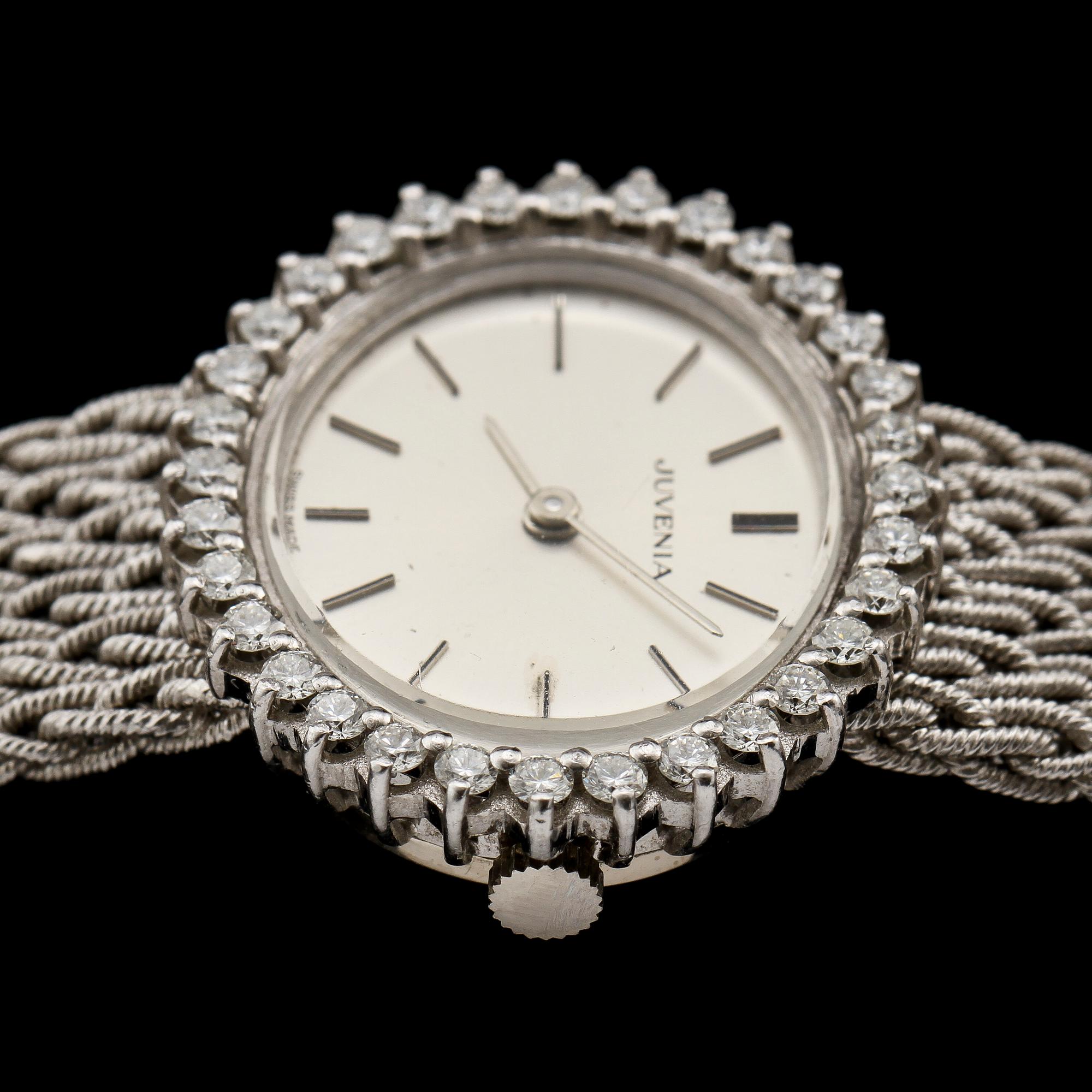 DAMARMBANDSUR, 18k vitguld med 32 briljantslipade diamanter, tot ca 0.96 ct, Juvenia, Schweiz, 1900-tal. Vikt 50 g.