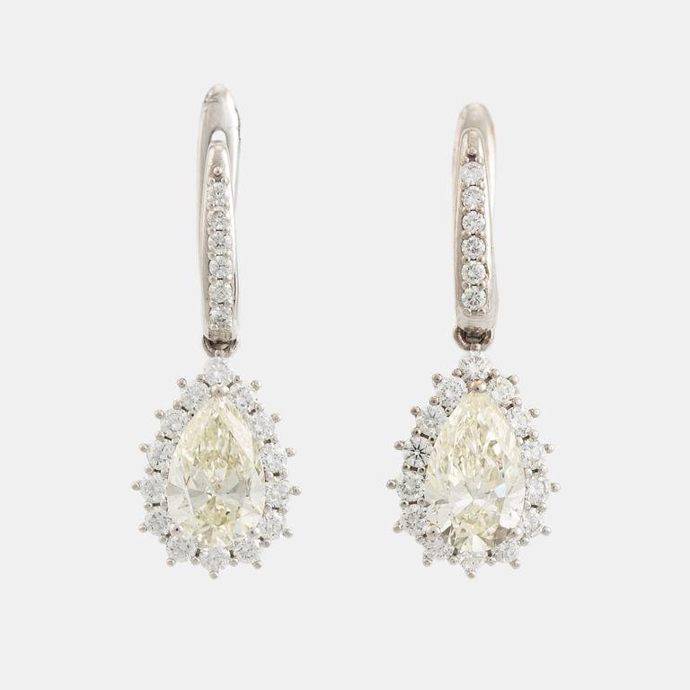 Pear shaped diamond earrings.