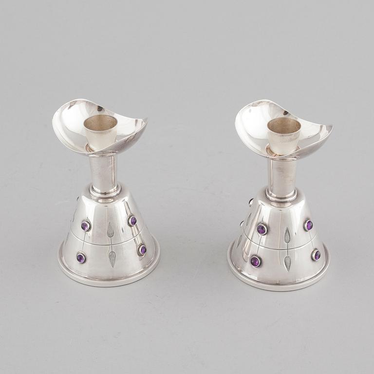 A pair of candleholders by Tage Göthlin in silver for Tesi, Gothenburg, year 1956. Weight in tot 580 gram.