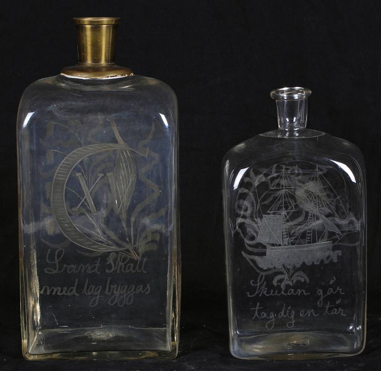 BRÄNNVINSFLASKOR, 2 st, glas, 1800-tal.