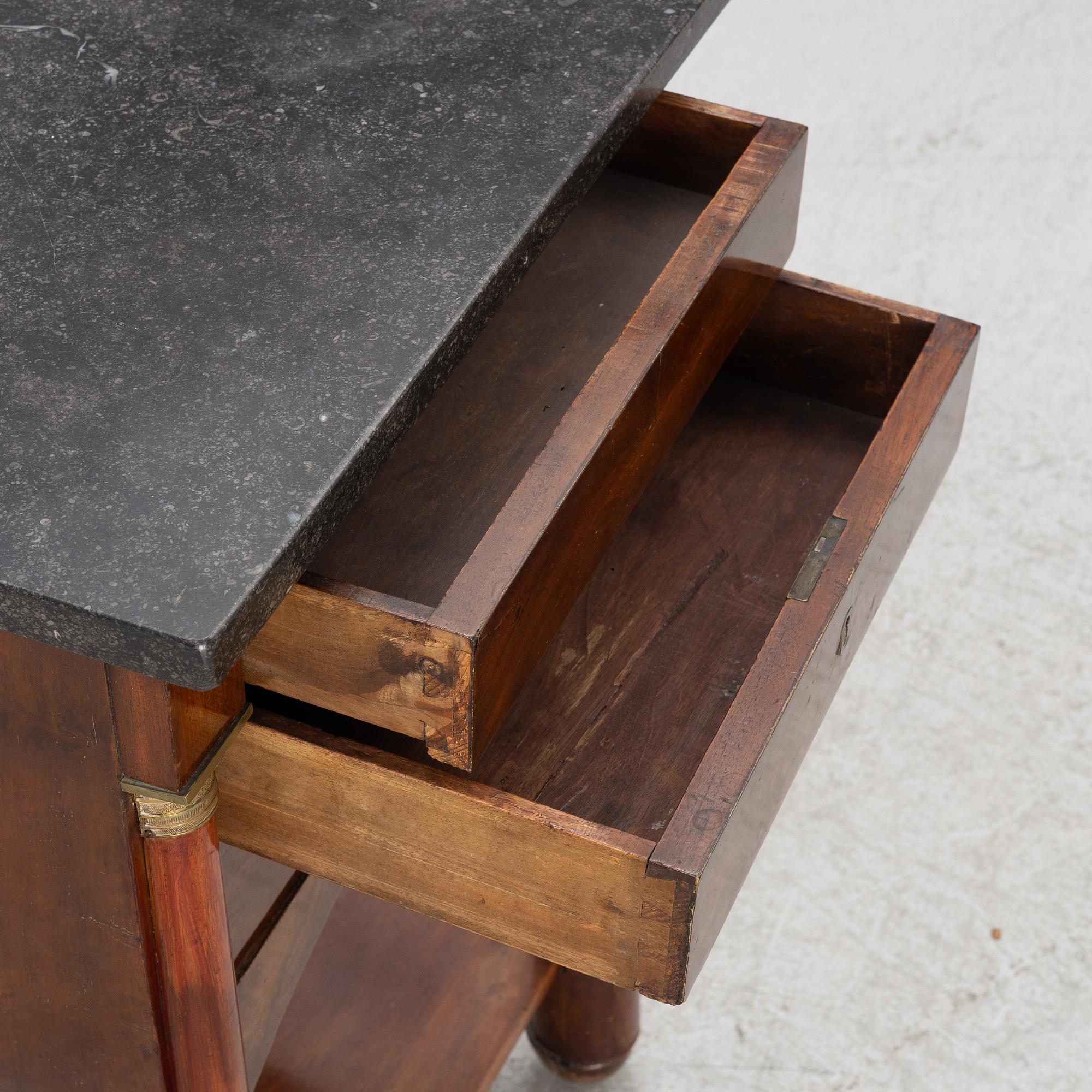 Bedside table, late Empire, mid-19th century.